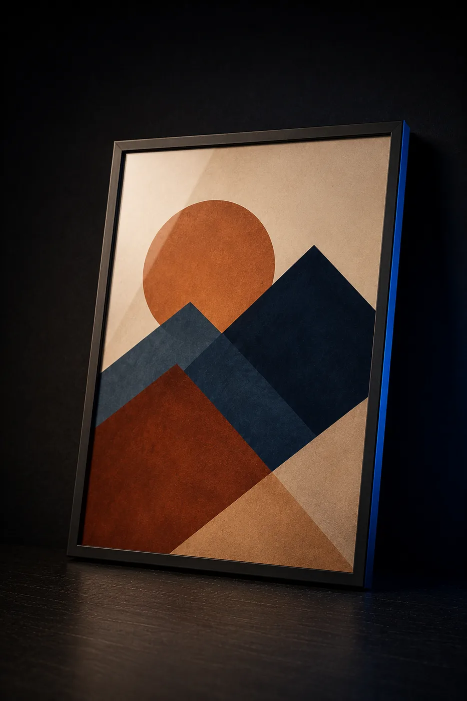 Framed geometric mountain-and-sun art print in cream, rust and indigo